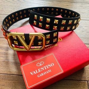 Valentino Garavani double stud leather belt with signature V logo.